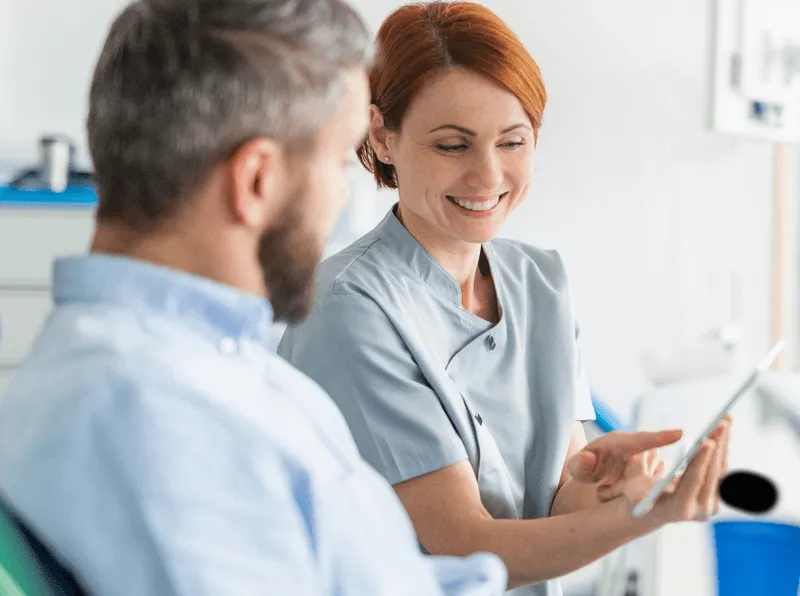 Dentist explaining treatment to a patient