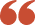 Red double quotation mark symbol.