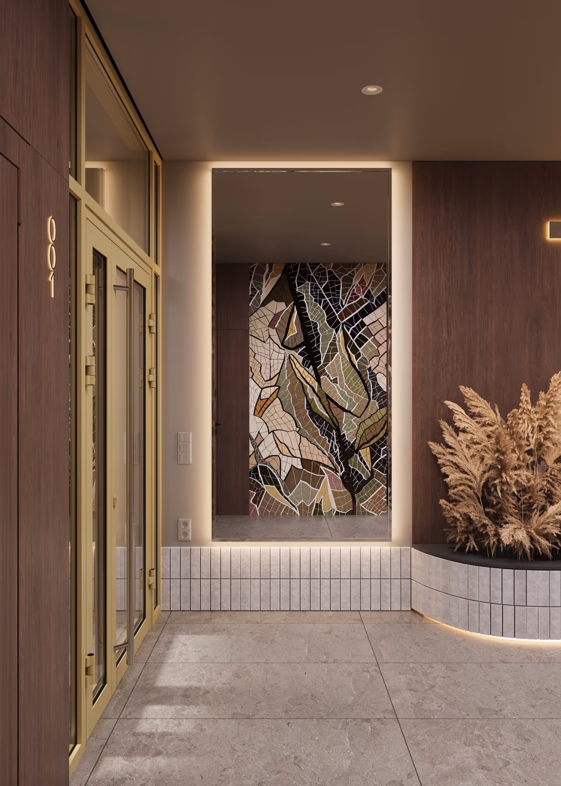 Modern entryway with gold-framed glass doors, large backlit mirror reflecting abstract wall art, tiled floor, and dried pampas grass in curved planter.