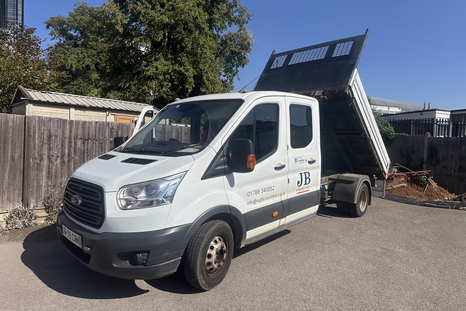 JB Construction van at a residential property