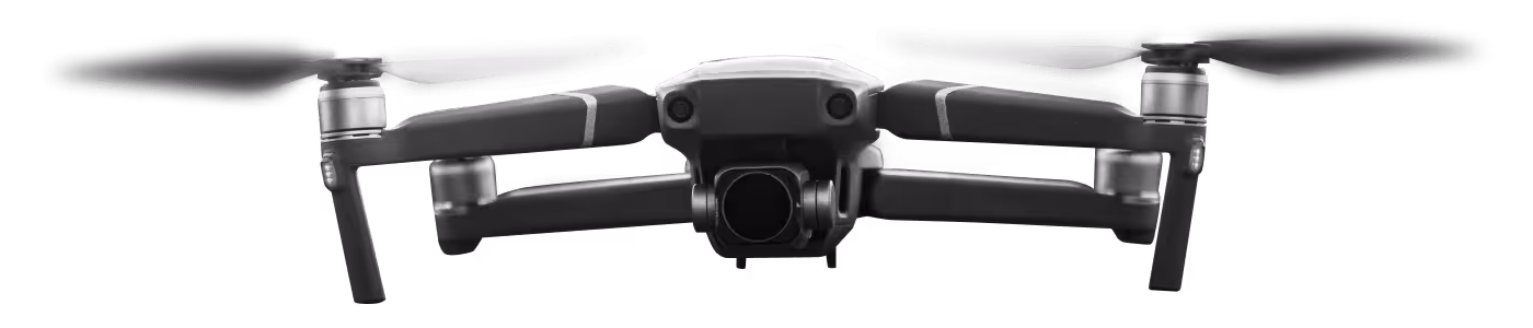 Front view of a compact quadcopter drone with four propellers and a camera mounted underneath.