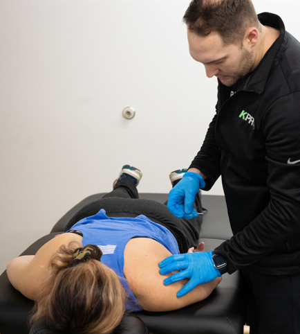 Patient working with a provider at a physical therapy clinic in Winston Salem 