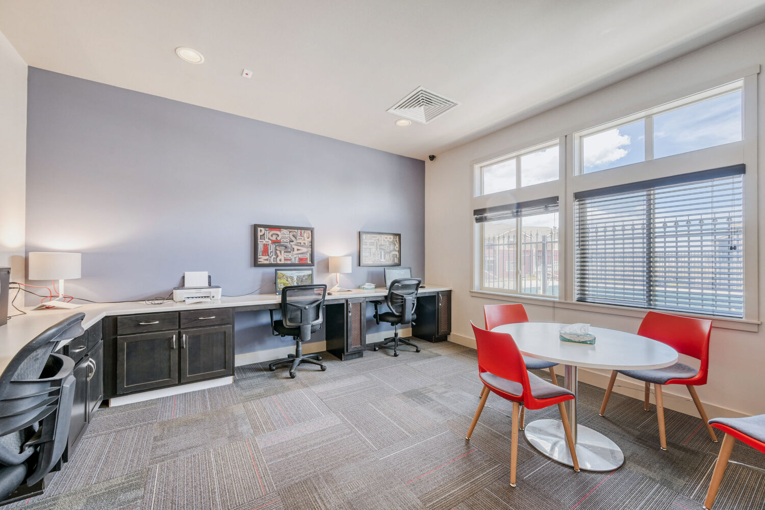 business center with computers and additional seating