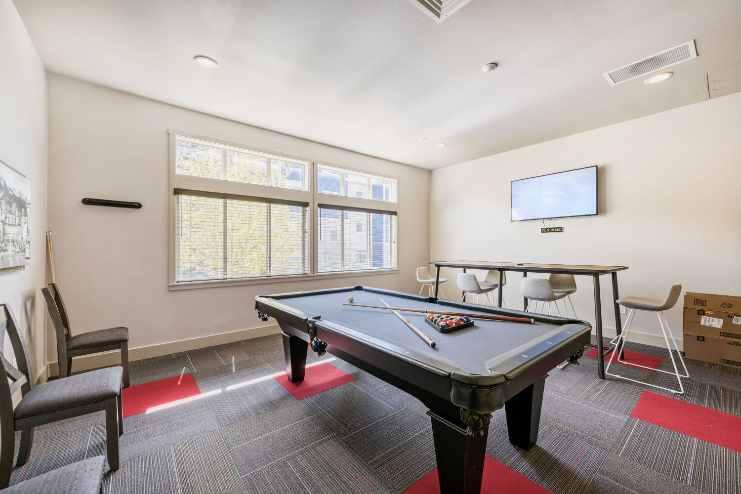 game room with billiards and additional seating