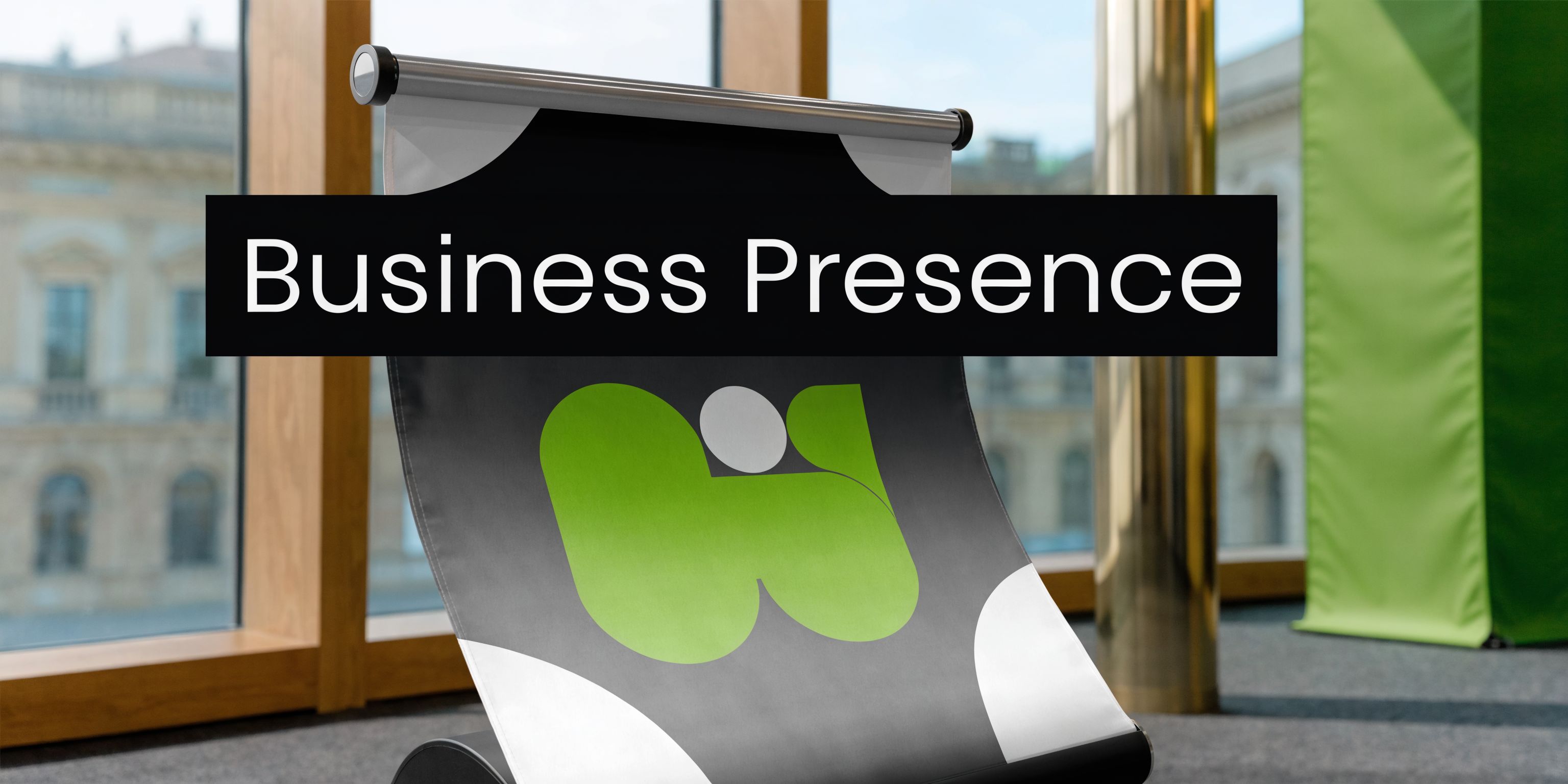 A professional roll-up banner featuring a green logo and the text Business Presence indoors