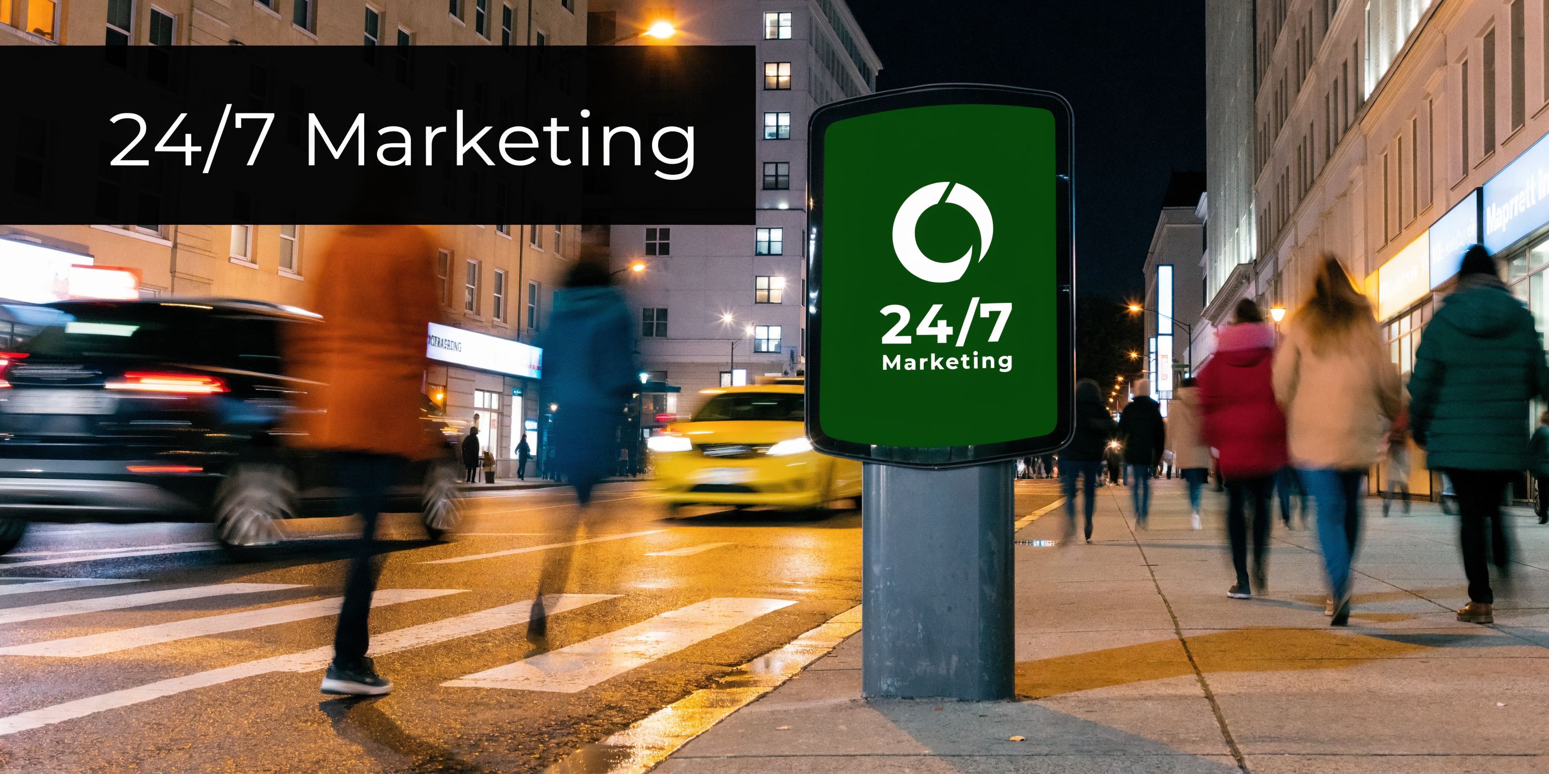 A night street view featuring a glowing green advertisement board for 24/7 Marketing in a bustling city.