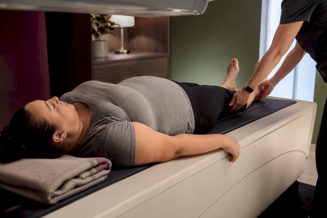 Patient receiving baseline DEXA scan