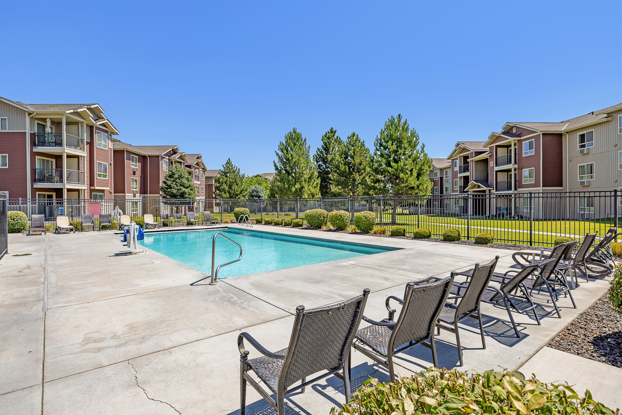 View of pool and apartments
