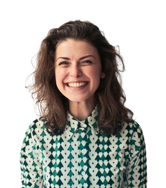 Smiling woman with curly brown hair wearing a green and white patterned button-up shirt.