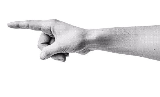 Right hand pointing to the left with the index finger extended and other fingers curled in.