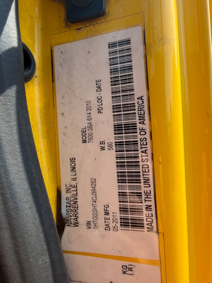 Navistar data plate showing model 7600 SBA 6x4 and a May 2011 build date