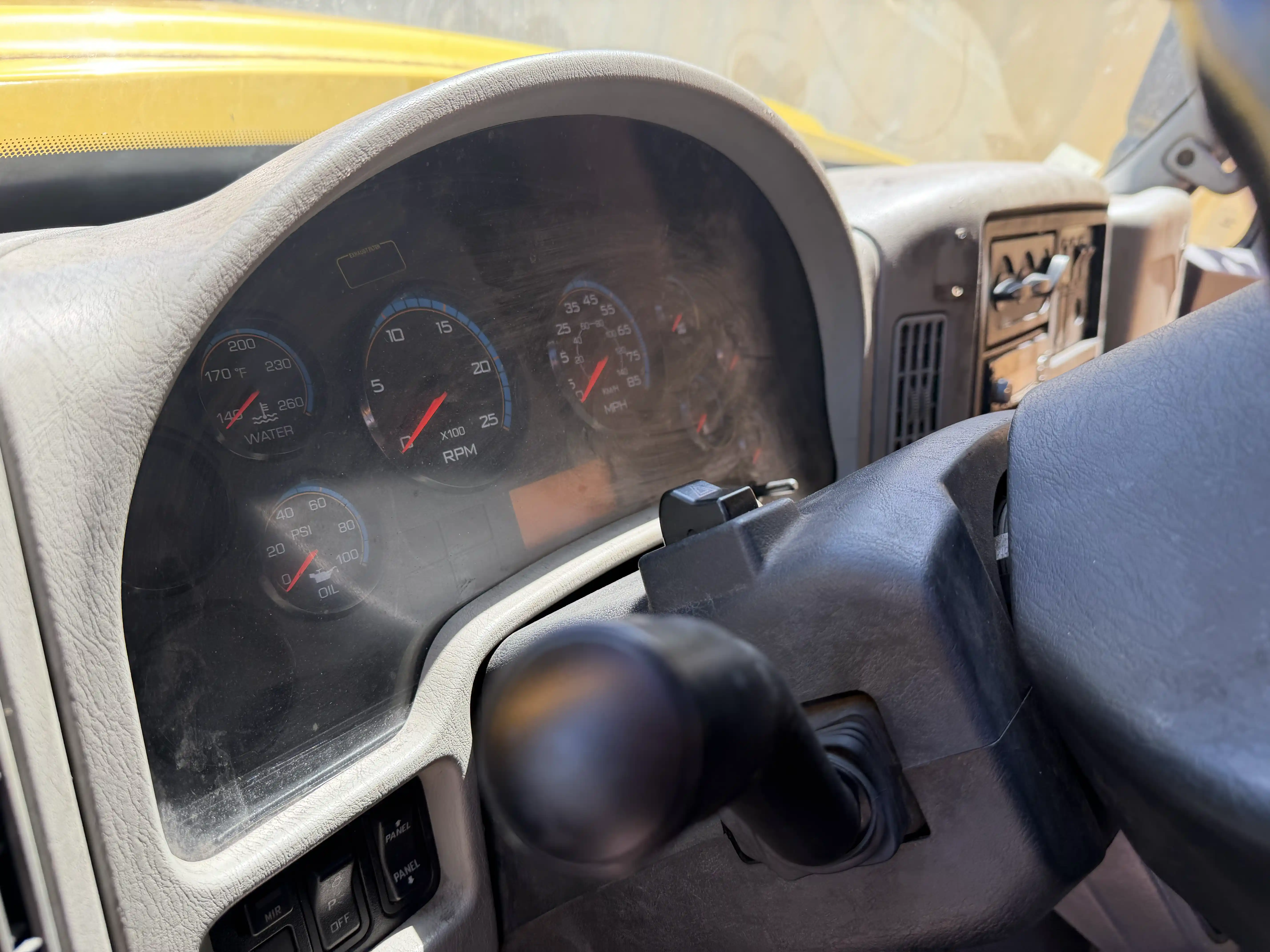 Instrument cluster showing water temperature, tachometer and speedometer