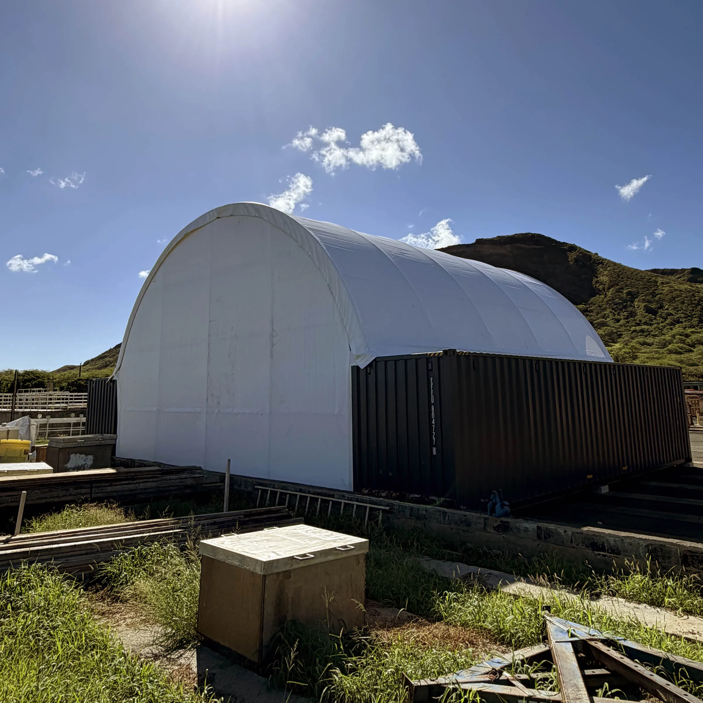 Side view of a completed container tent in Hawaii