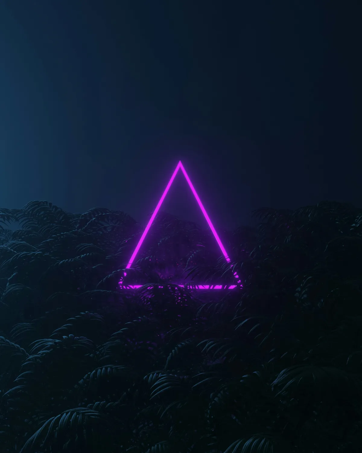 Purple neon triangle hovering above a mountain landscape at night.