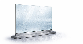Modern glass panel with water droplets on its surface mounted on a metal base.