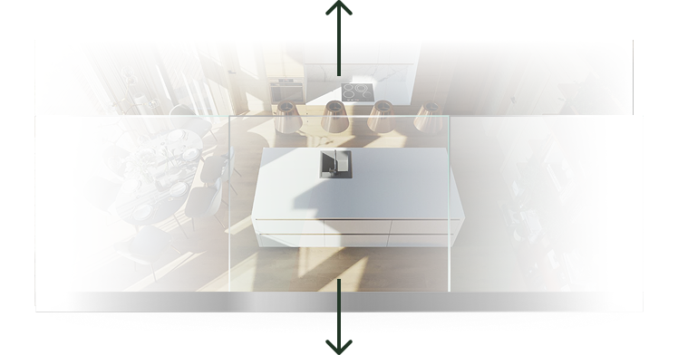 Top-down view of a modern kitchen with a central island, bar stools, and a dining table set for four.