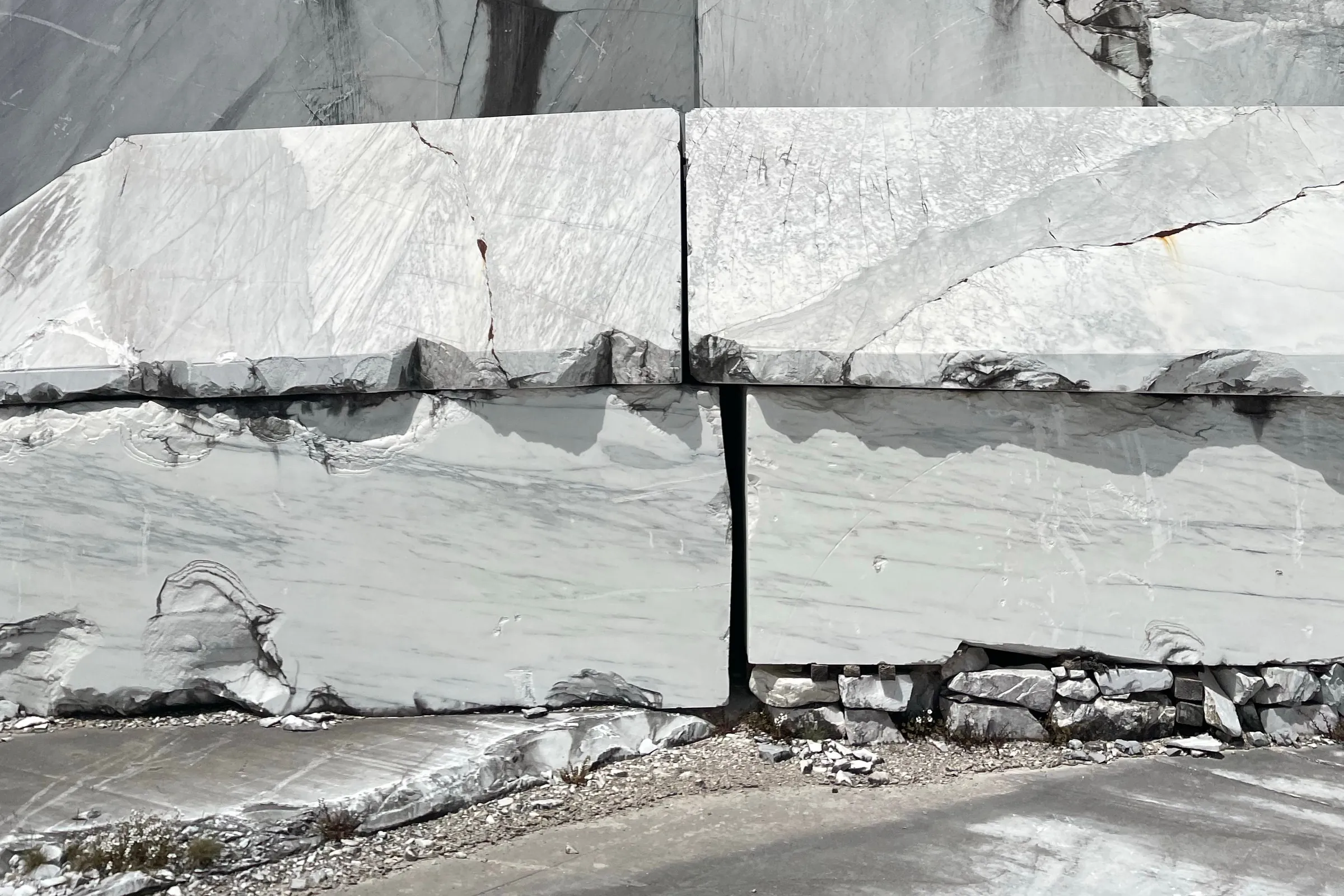 White marble blocks stacked at a stone yard