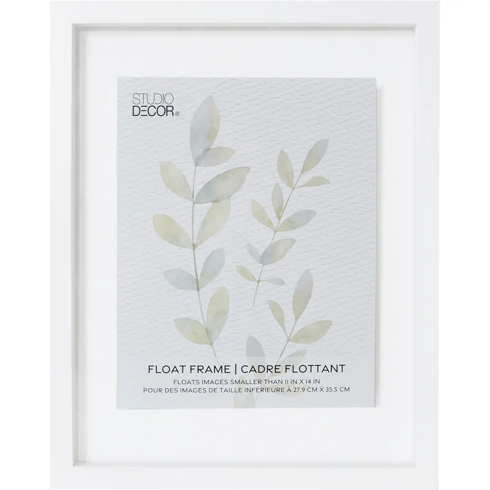 White float picture frame with a watercolor leaf print inside labeled 'Studio Decor'.