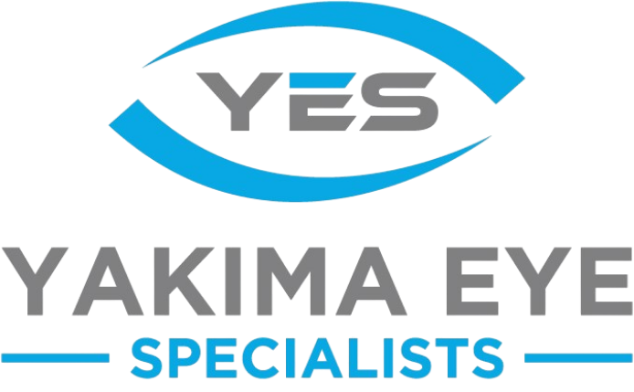 Logo with a stylized blue eye shape enclosing 'YES', above bold gray text 'YAKIMA EYE' and blue text 'SPECIALISTS' flanked by blue dashes.