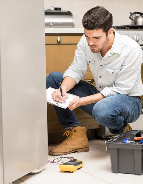 Technician performing Diagnostics & Preventive Maintenance