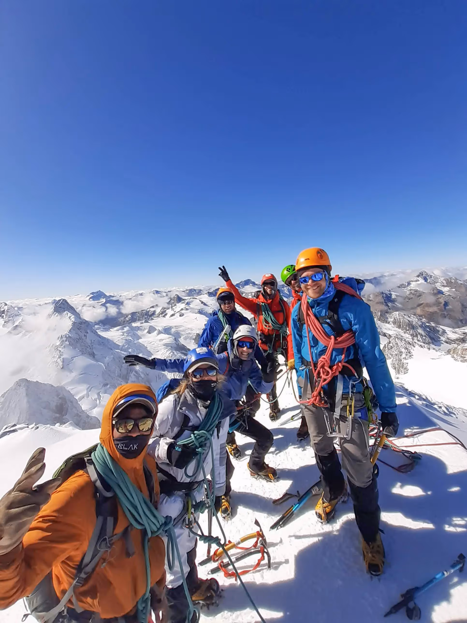 Alpine Skills Course participants and guides posing on summit