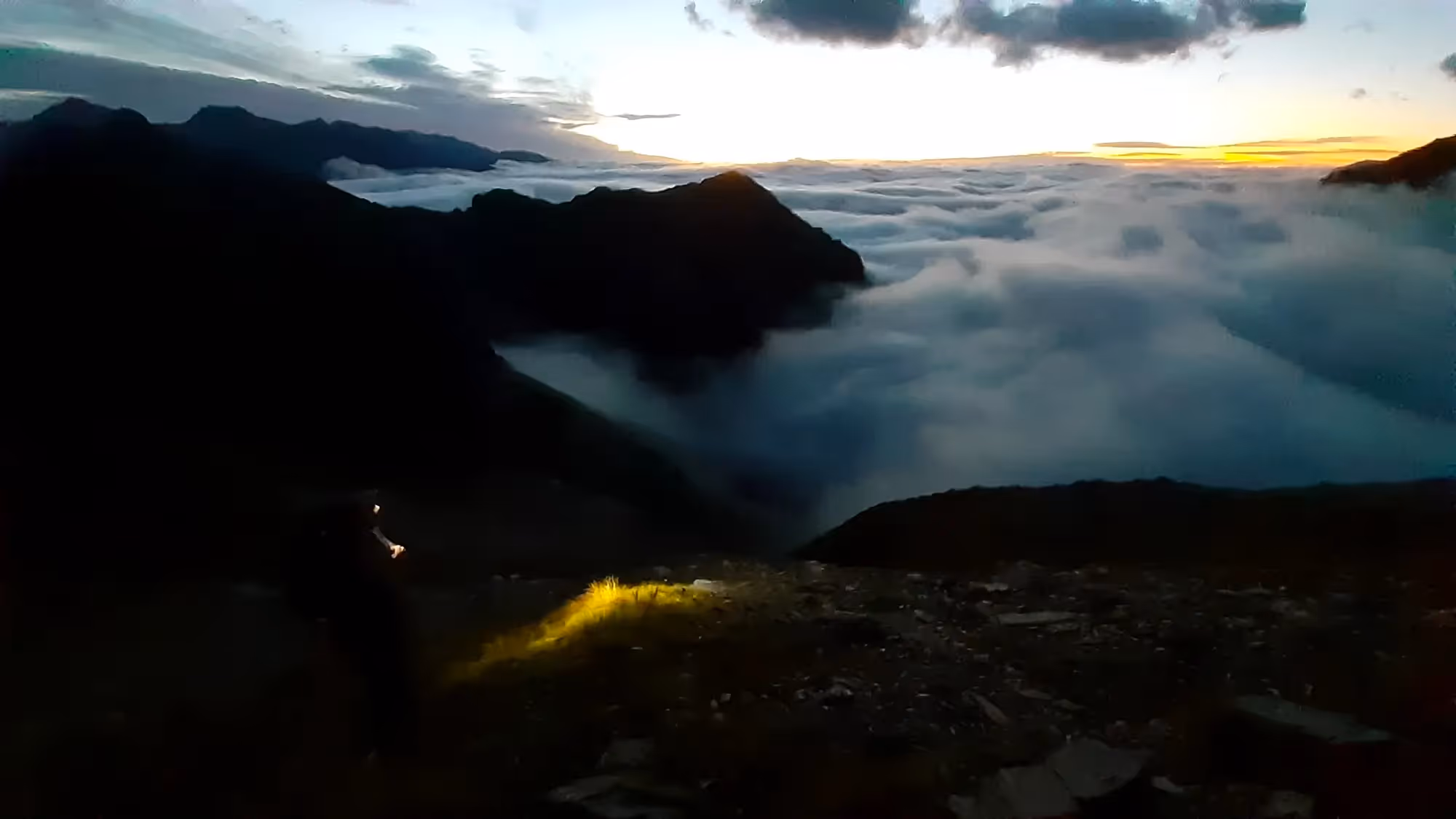 Early morning climber with headlamp