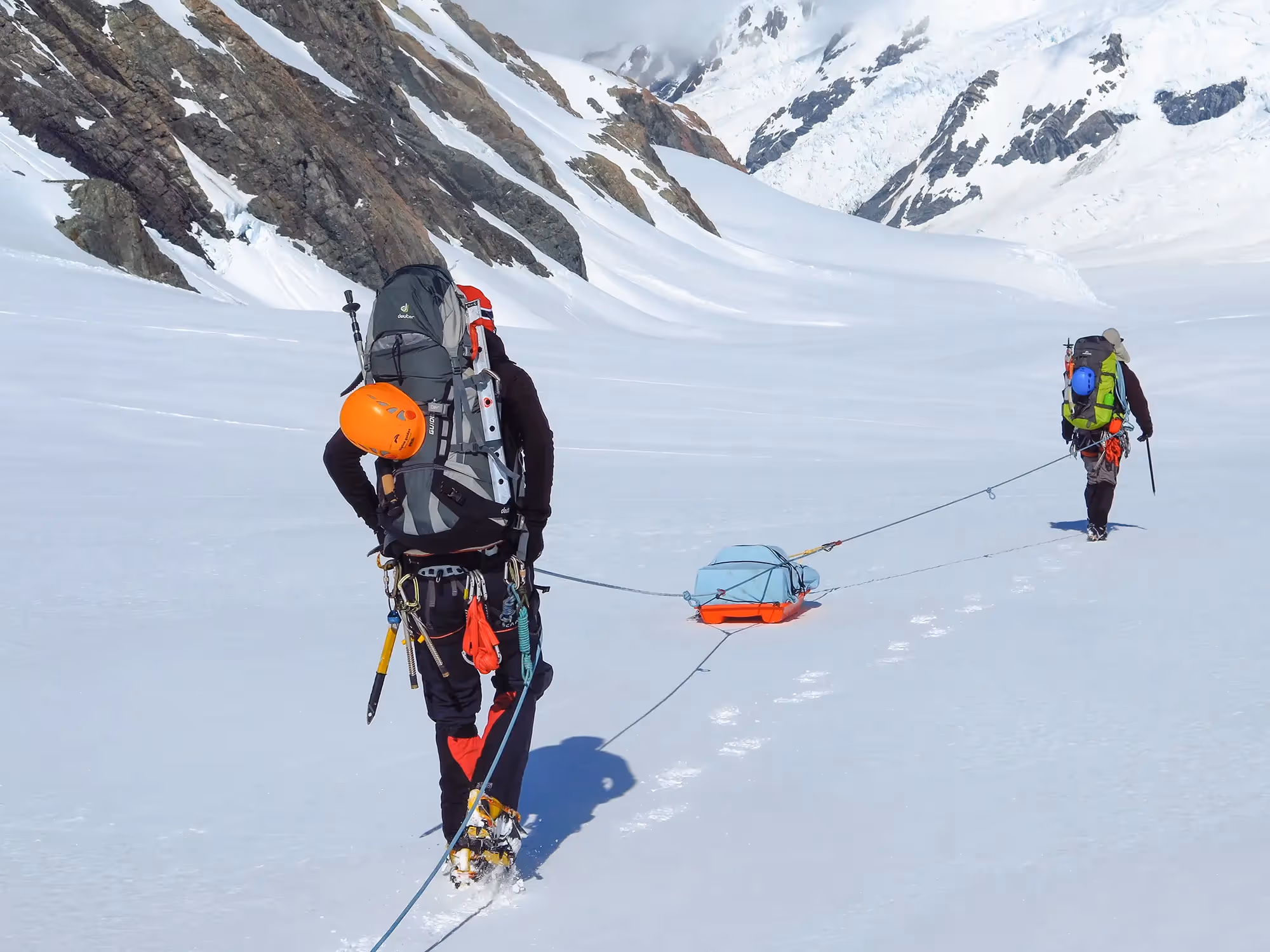 Expedition Training Course participants moving camp across glaciated terrain