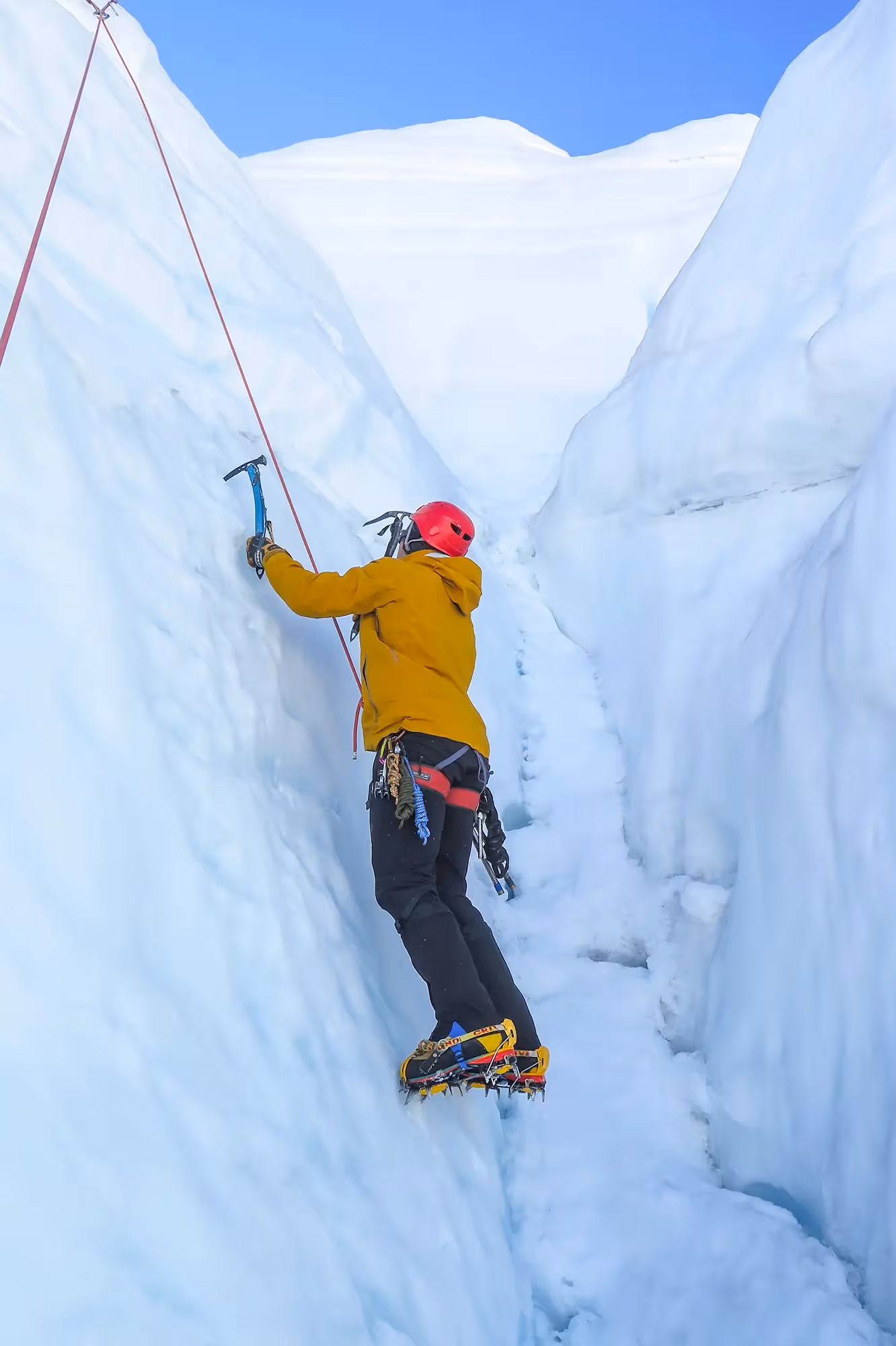 Guest practising ice climbing on Tasman Glacier