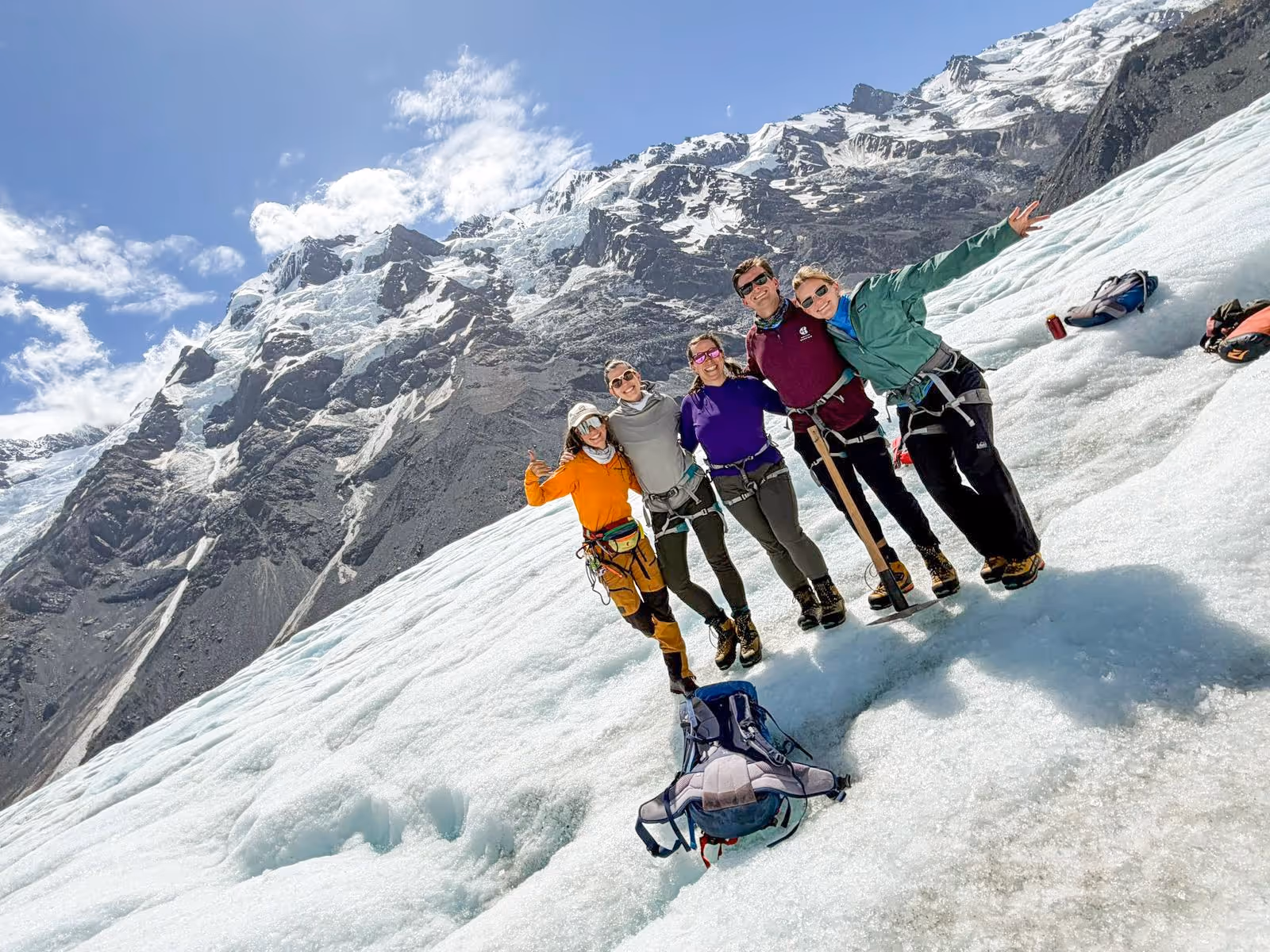 Guests stopping for photo with alpine views