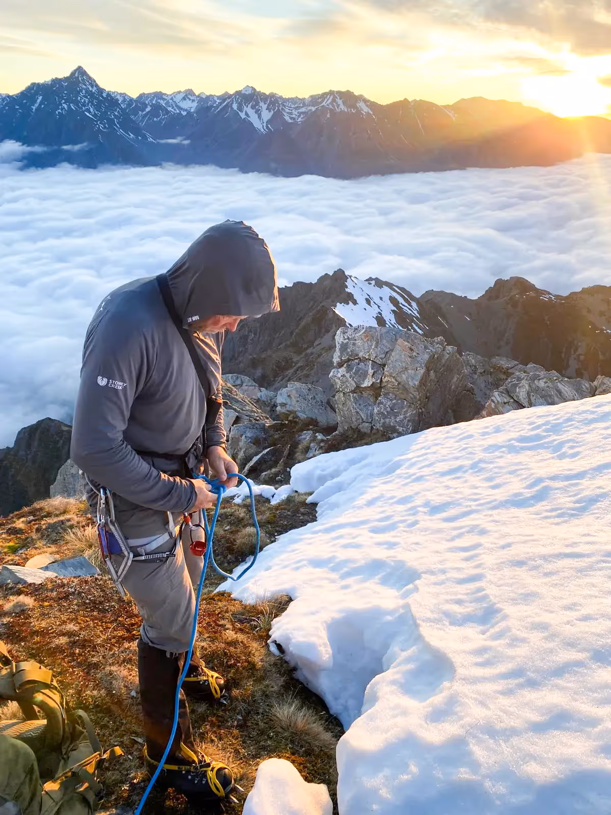 Climber checking safety rope near the Edgar Thompson summit.