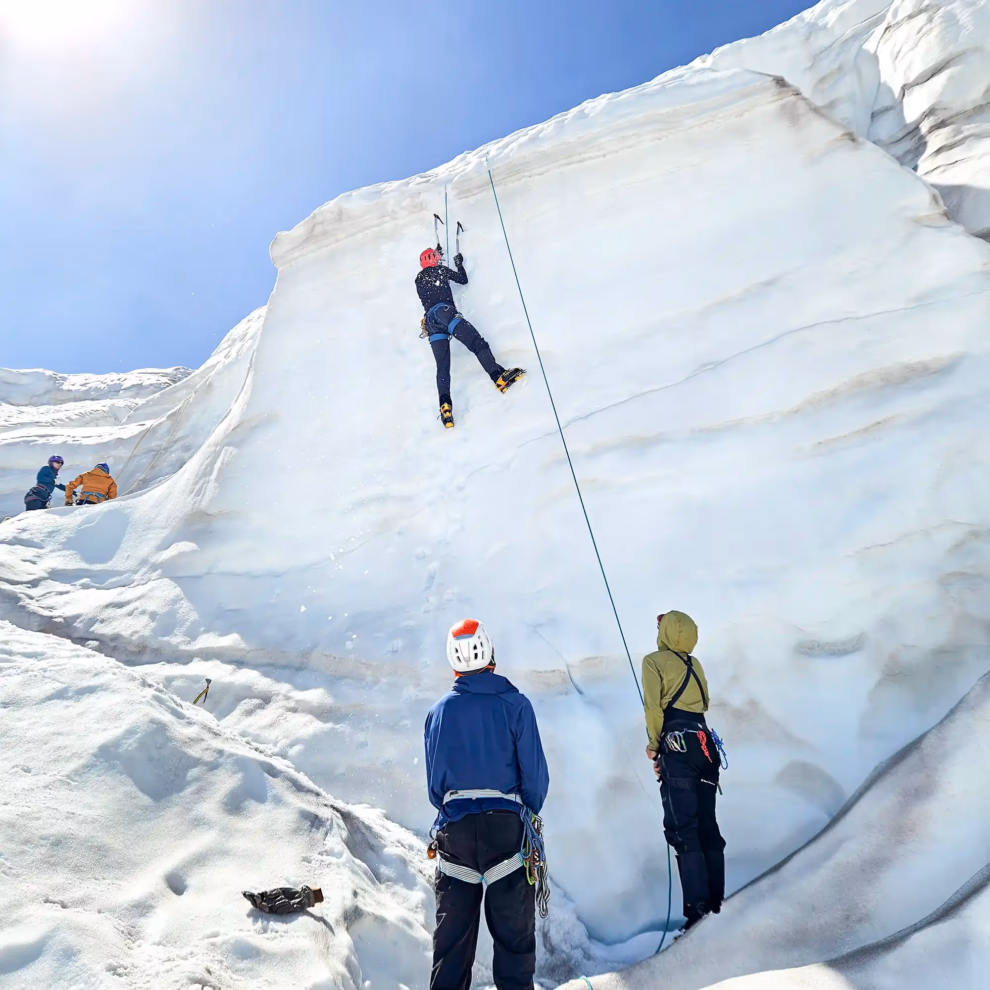 Alpine Skills Course participants ice climbing on Tasman Glacier
