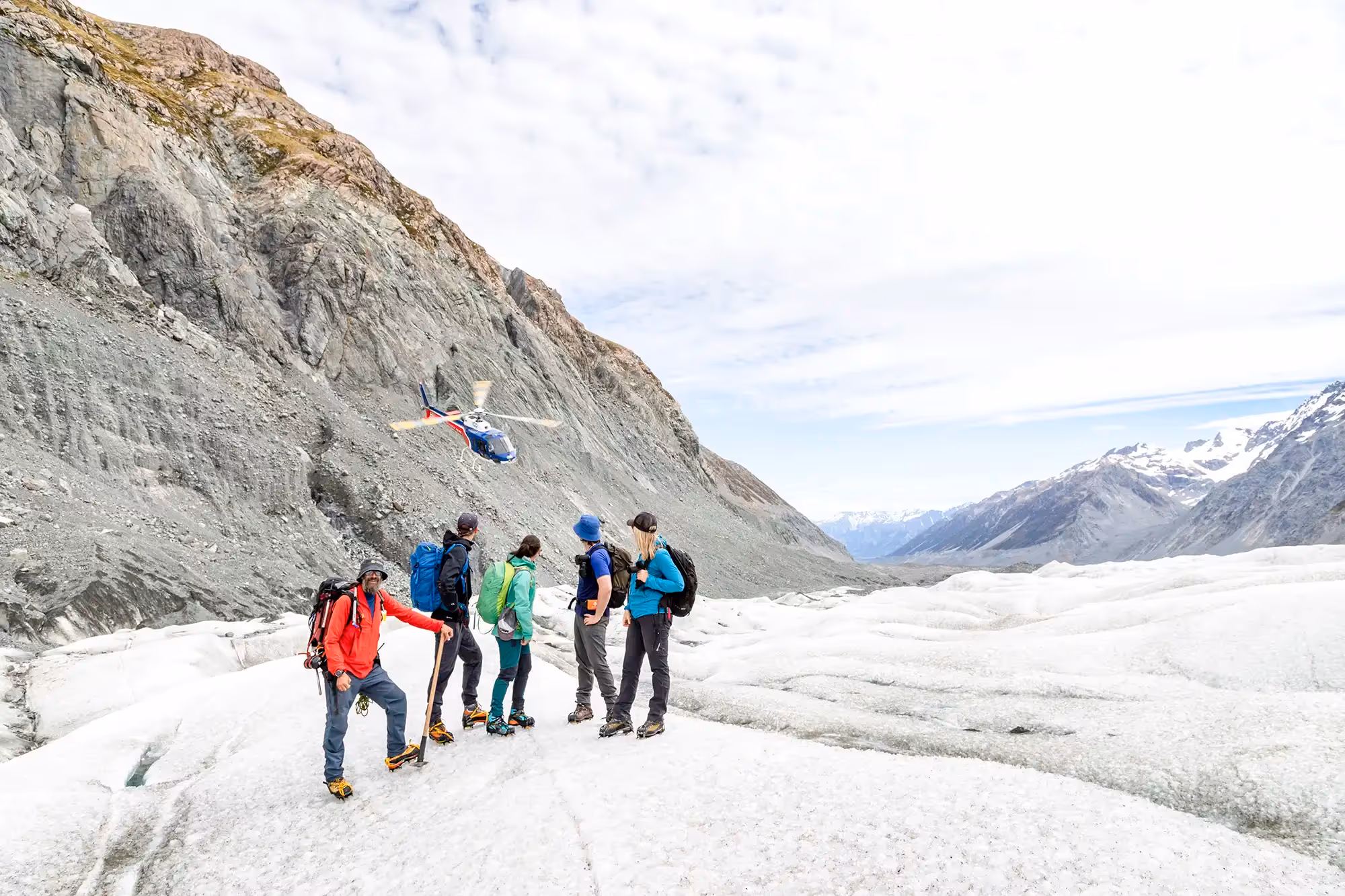 Exclusive Tasman Encounter guide briefing guests on Tasman Glacier