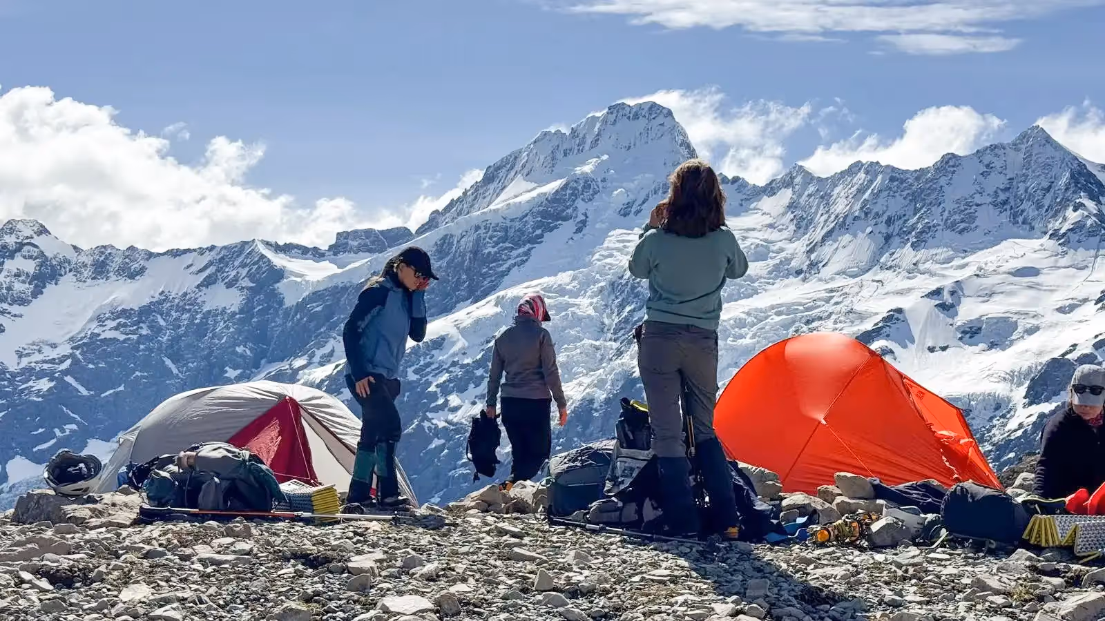 Mountain Experience Course participants camping on the summit with Mount Sefton in the background