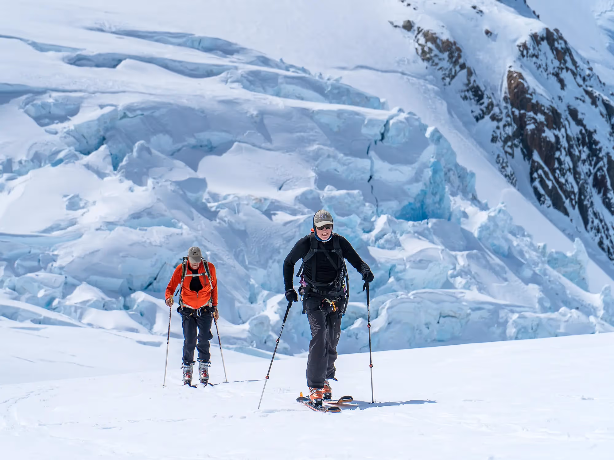 Two skiers on the Tasman Glacier