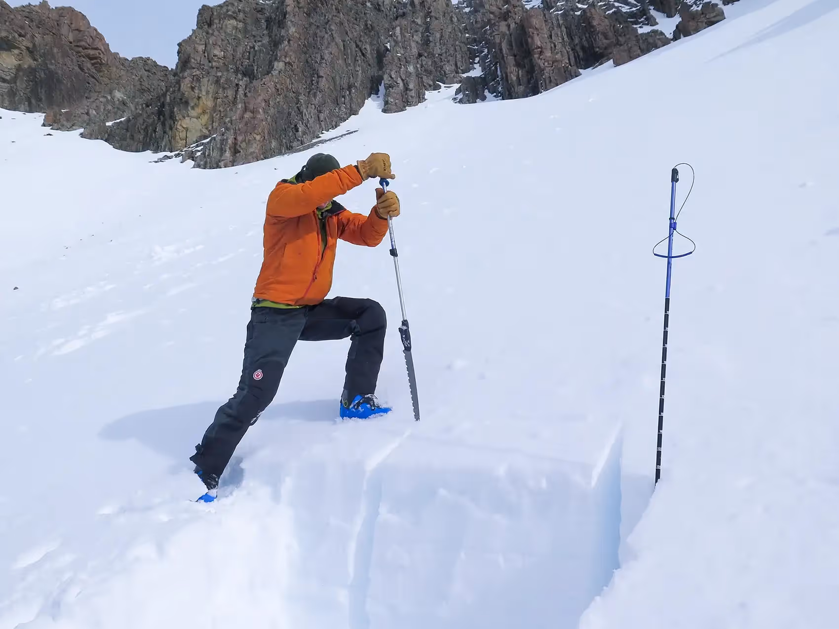 valanche course participant probing snow