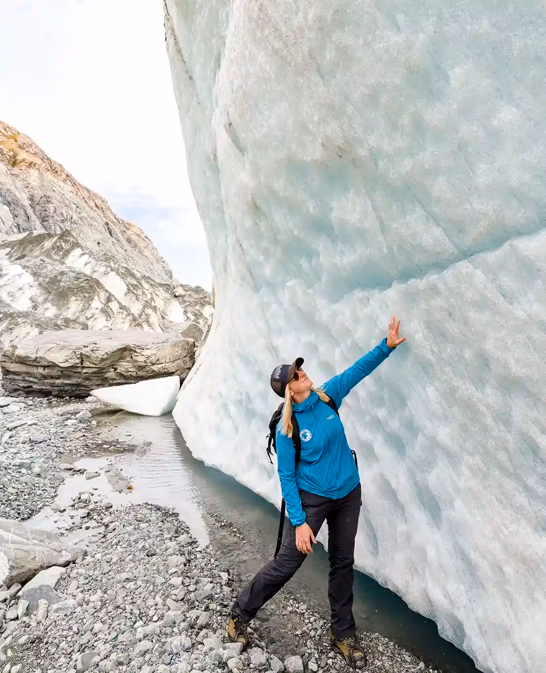 Exclusive Tasman Encounter guest exploring ice formation on glacier