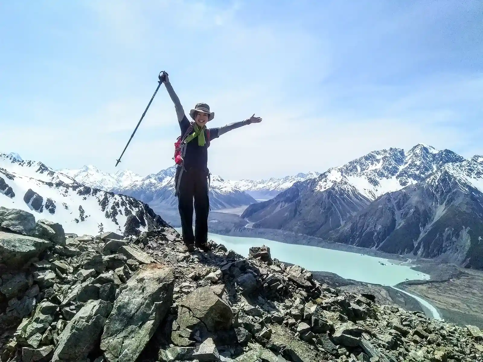 Mount Wakefield Hike guest celebrating on summit