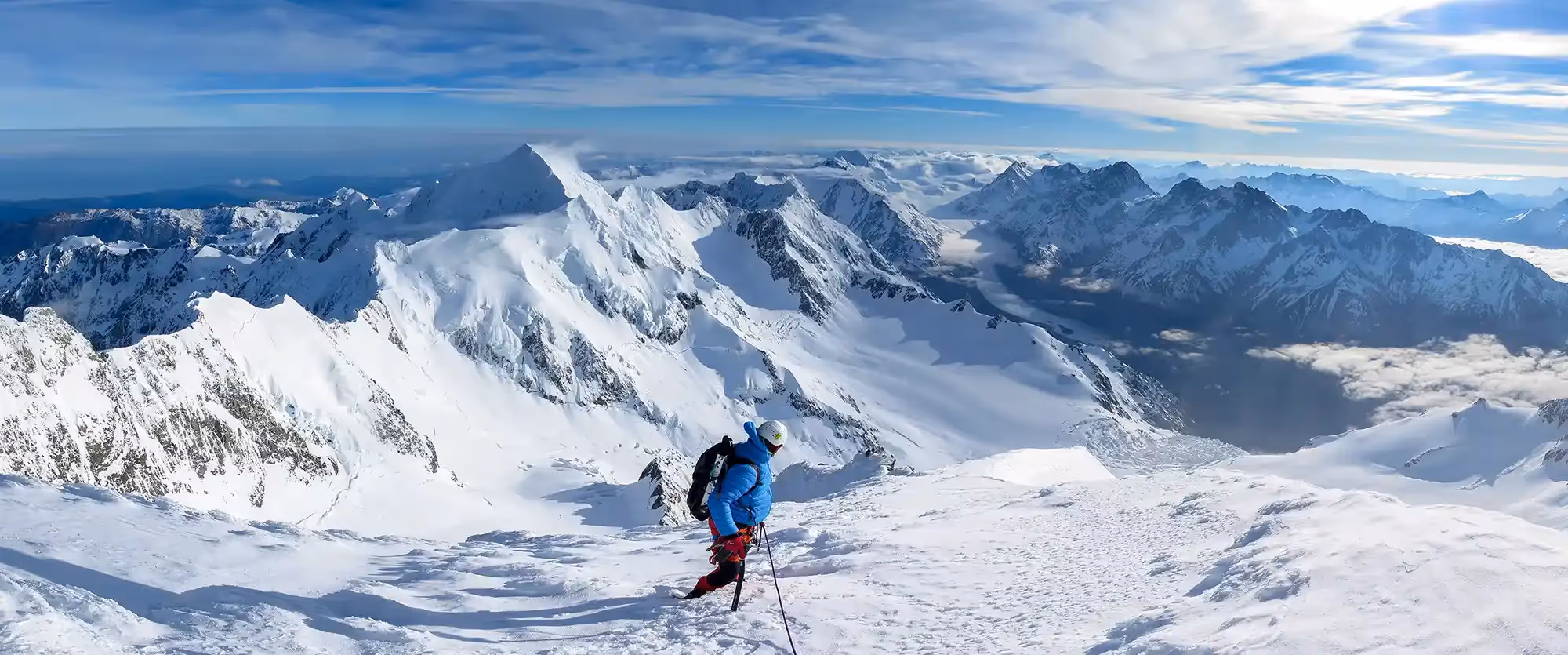 Guest looking down snowy steep slope