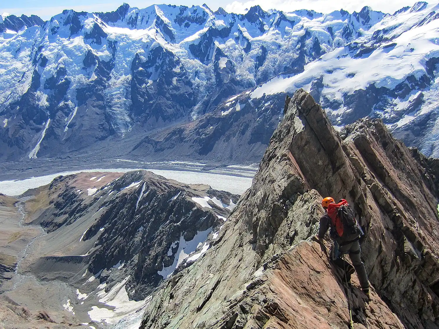 Malte Brun trip guest rock climbing near summit