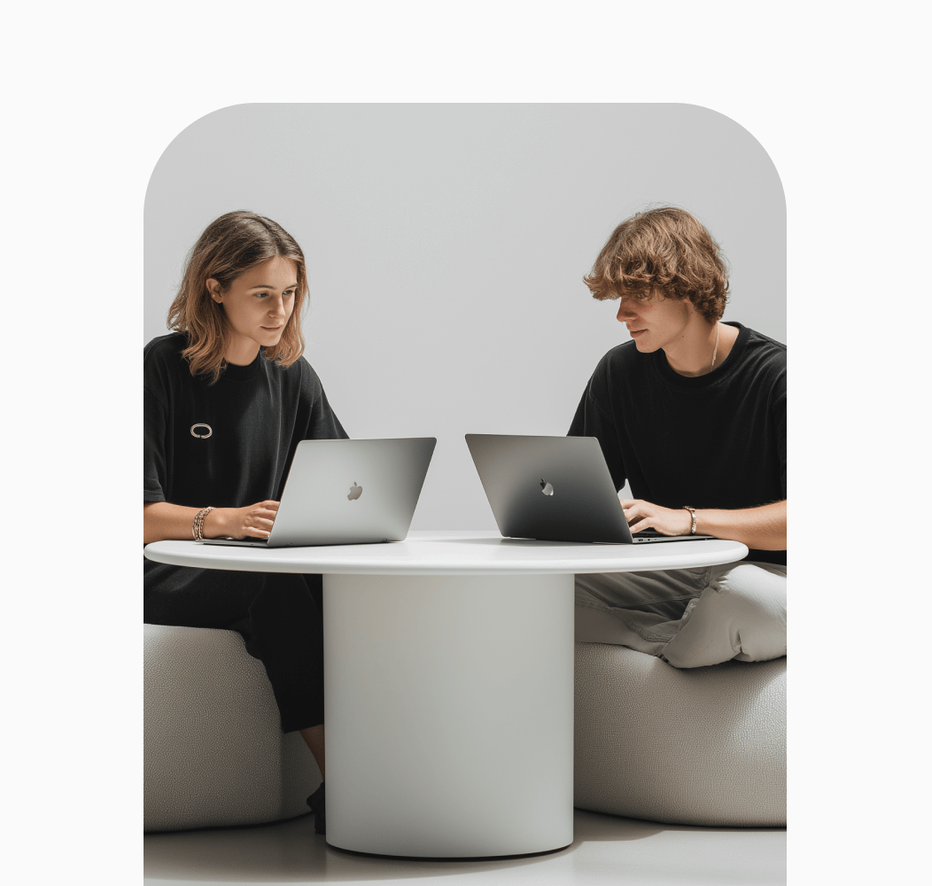 Two People Working On Laptops Gadgetar Webflow Template | BRIX Template  
