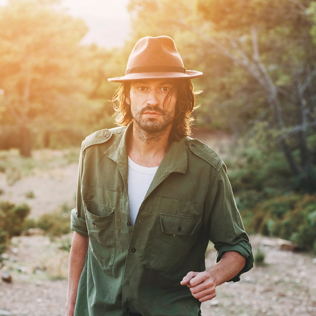 Field manager inspecting the plantation grounds during the harvest season