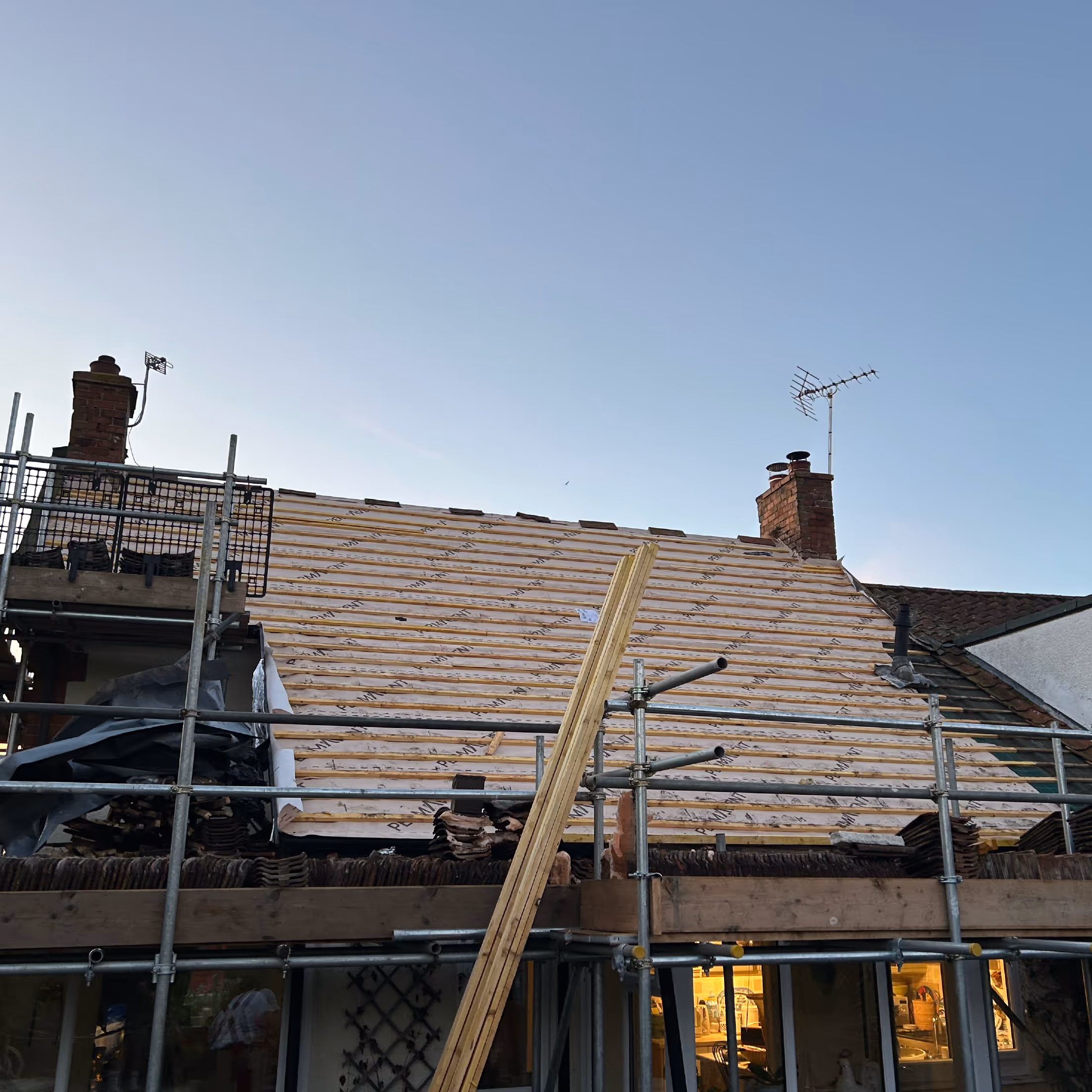 Smarter Roofing Team Working On Roof Project In South West