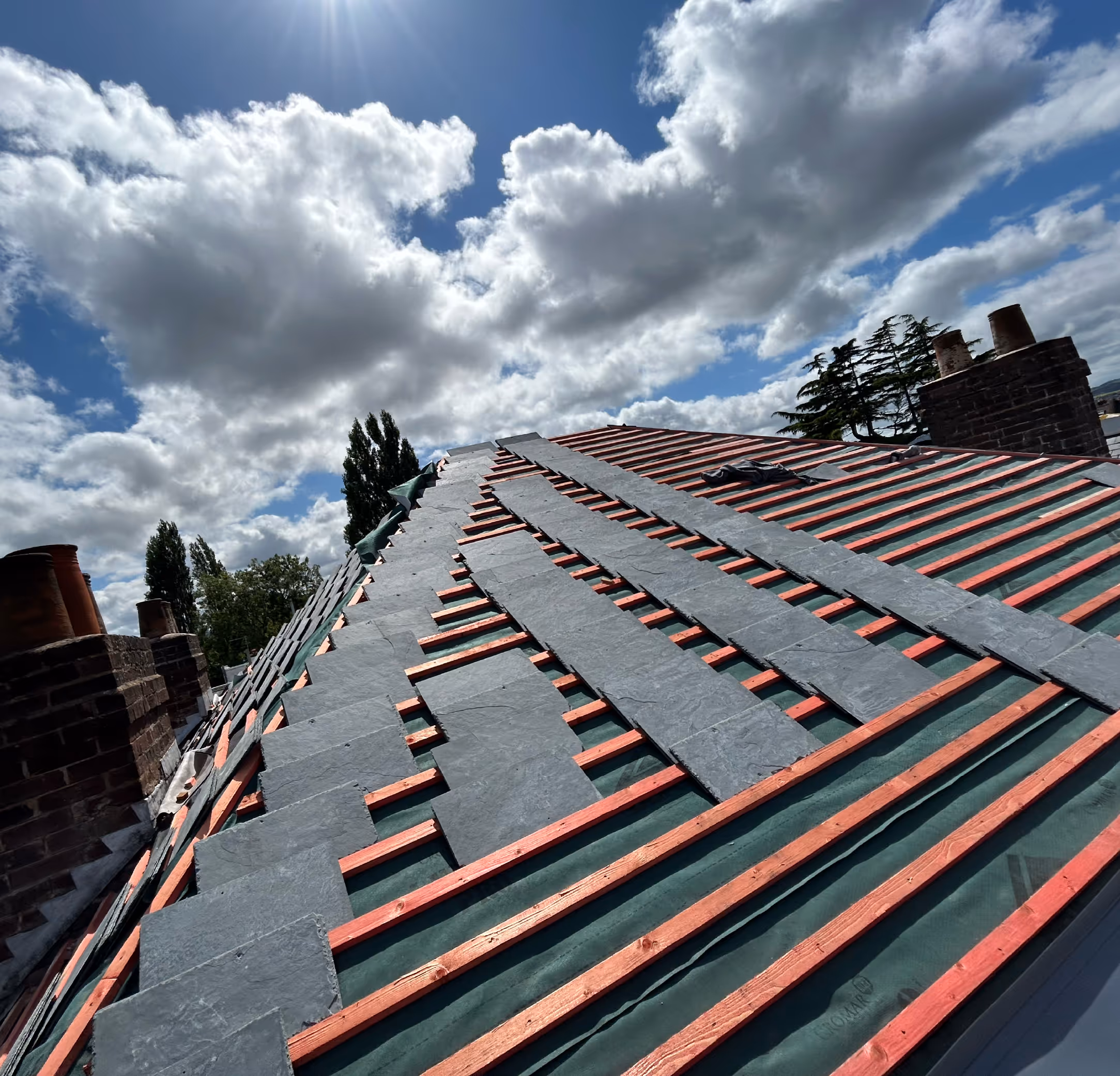 Smarter Roofing Team Working On Roof Project In South West