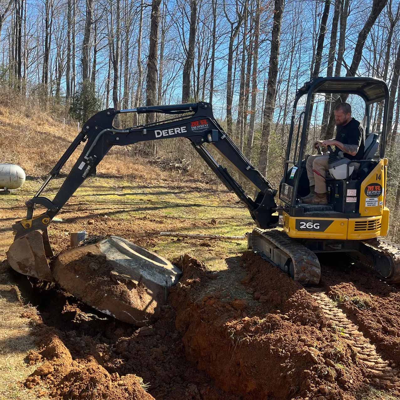Drain field installation in north Georgia; clearing the drain field with heavy machinery.