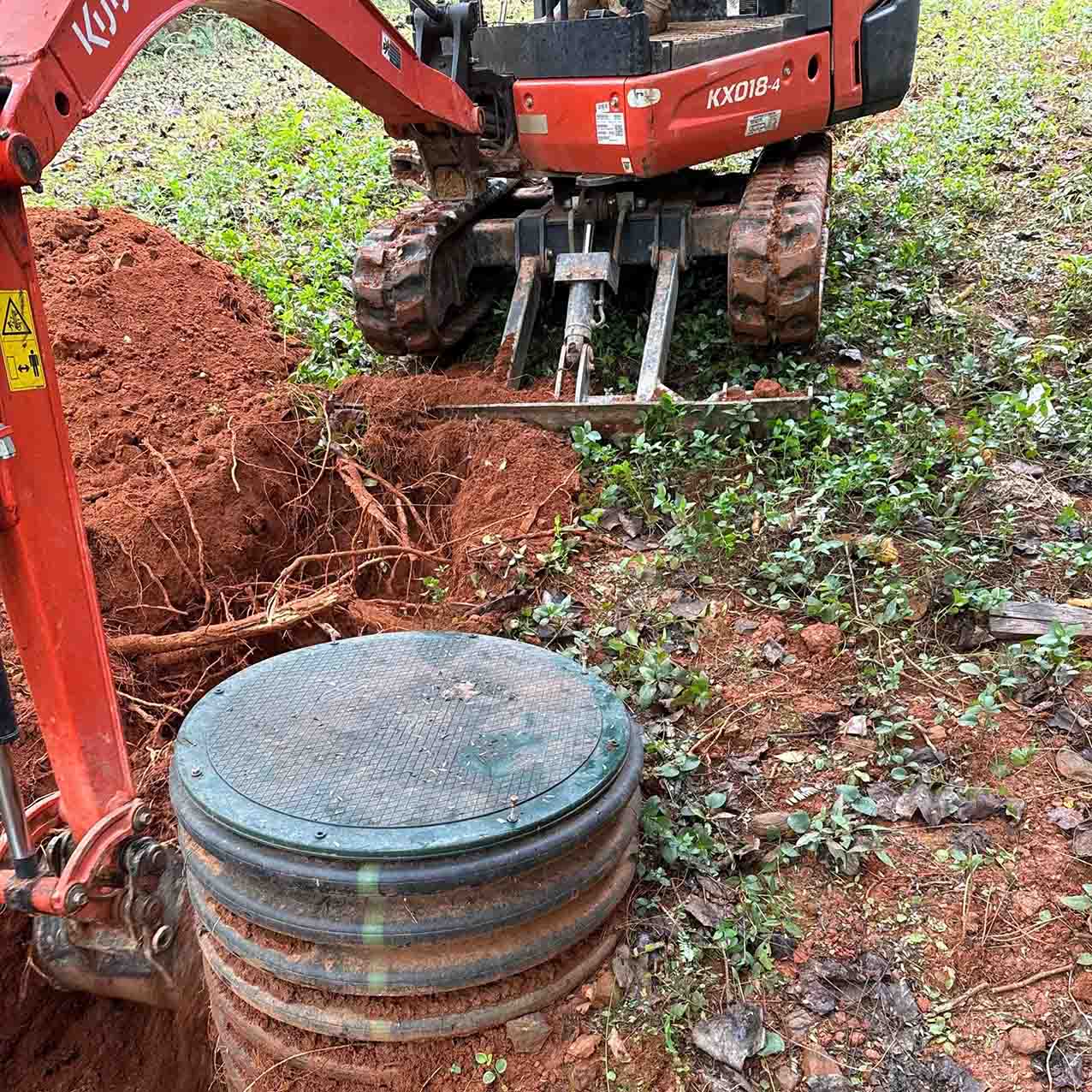 Septic tank repair in north Georgia; repair on property with machinery.