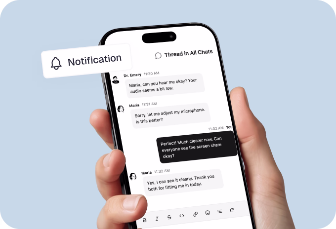 Hand holding smart phone with an automated SMS notification of upcoming doctor appointment