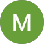 Vihreä ympyrä, jossa on valkoinen iso kirjain M.