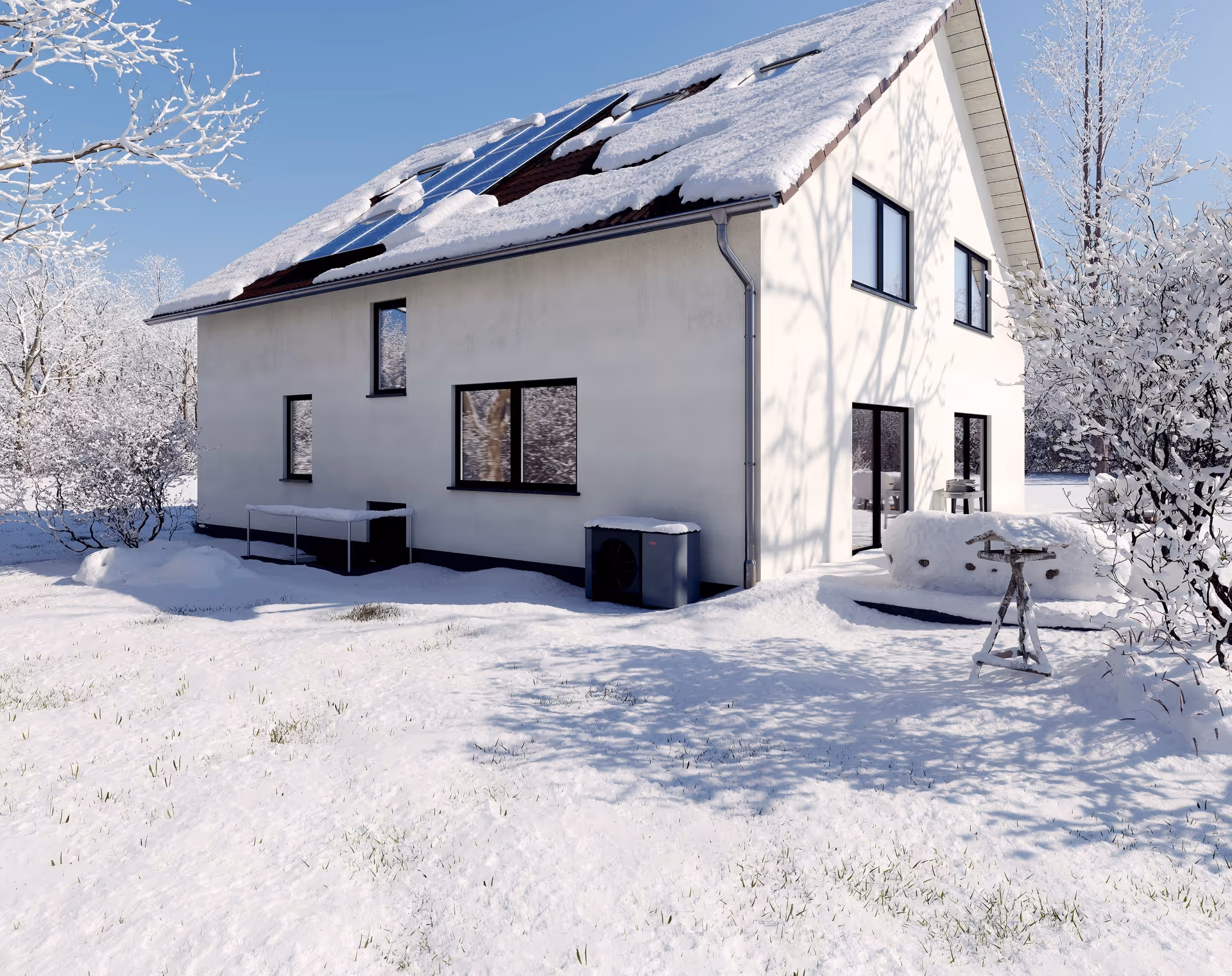 Saniertes EFH in Winterlandschaft mit Wolf Wärmepumpe