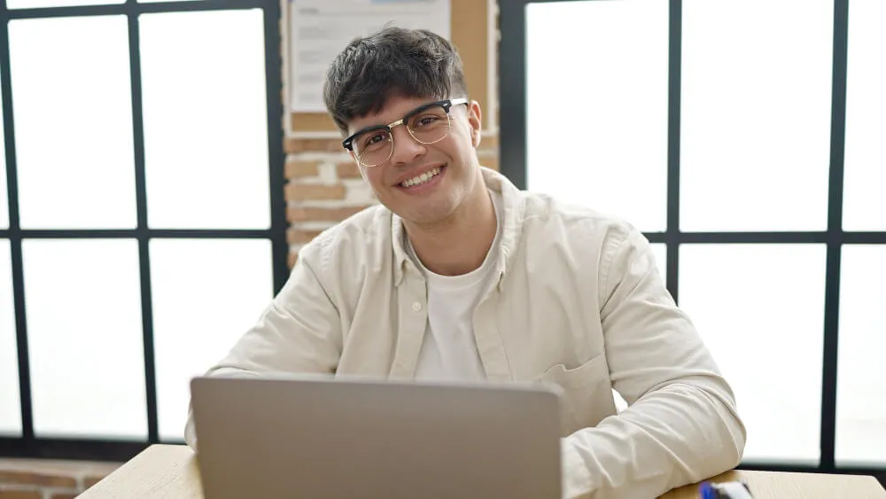 young man worker using laptop
