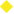 Yellow diamond-shaped sign with a black cross in the center.